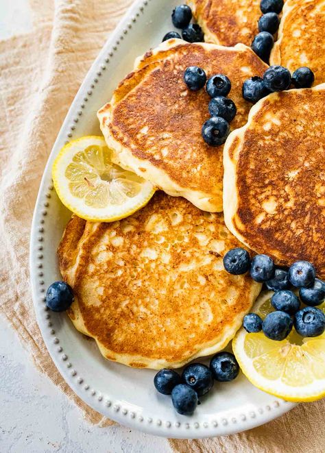 Lemon Ricotta Pancakes Recipe - Dinner, then Dessert Pancake Creations, Italian Pancakes, Ricotta Pancakes Recipe, Lemon Ricotta Pancakes Recipe, Fluffy Pancakes Recipe, Freeze Pancakes, Fluffy Pancake Recipe, Dinner Then Dessert, Lemon Ricotta Pancakes