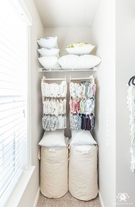 How to organize throw pillows, inserts, and extra throw blankets in a small closet- there are HUNDREDS pictured and organized in this little office closet nook! #organization #organized #pilloworganization #storage #closetorganization Throw Pillow Storage, Basement Storage Organization, Closet Nook, Linen Closet Storage, Gift Wrap Organization, Bathroom Closet Organization, Office Closet, Pillow Storage, Closet Office