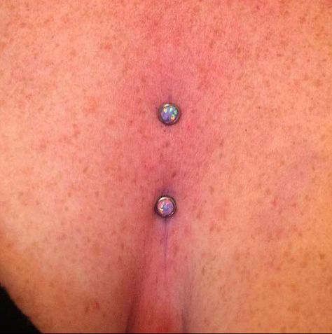 Lower sternum/cleavage surface piercing with 5mm purple opals by @mollymoonpierce #920tattoo #920tattooco #920tattoocompany #piercing #piercings #sternumpiercing #purpleopal #purpleopals #cleavage #cleavagepiercing #cleavpiercing #piercedladies #surfacegems #opaljewelry #jewelrygram #jewelryvibe #piercingsbymollymoon Chest Piercings For Women Dermal, Piercing Chest Dermal, Sternum Piercing, Dermal Piercing Clavicle, Unique Dermal Piercing, Sternum Piercing Surface Dermal Anchor, Surface Piercing, Dermal Piercing, Tokyo Ravens