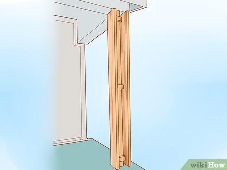 How to Wrap Porch Posts with Wood: 13 Steps (with Pictures) How To Cover Front Porch Posts, Porch Post Wraps Wood, Wrapping Metal Posts With Wood, Wrapping 4x4 Posts With Wood, How To Wrap Porch Posts With Cedar, Cover Pillars With Wood, How To Wrap Porch Posts Wood, How To Wrap Porch Columns, Wrap Pillars With Wood