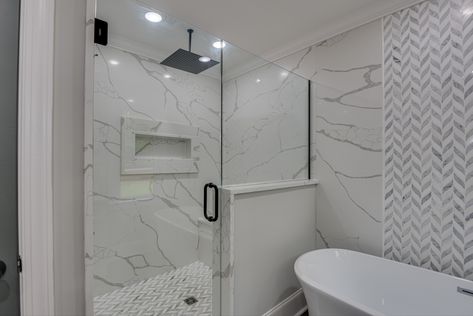 Quartz walls in shower with rainhead and marble accents Quartz Shower Wall, Quartz Shower Walls, Shower Walls, Bathroom Remodel Designs, Bathroom Reno, Bathroom Renos, Quartz Countertops, Shower Wall, Bathroom Remodel