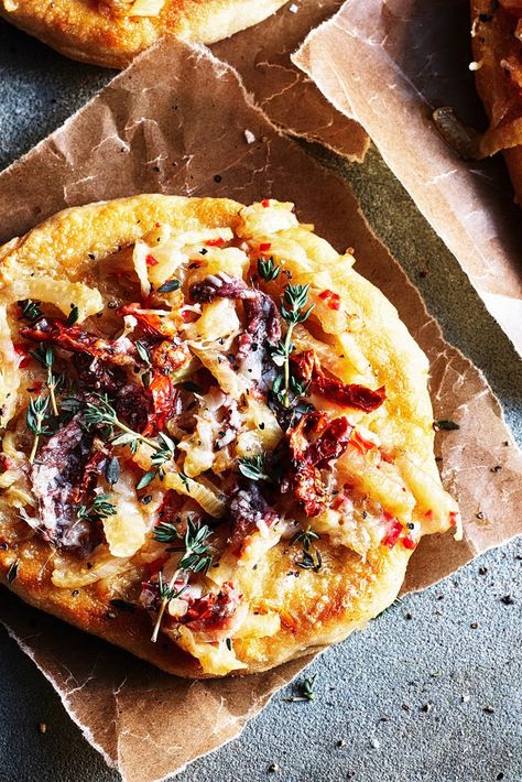 This Sicilian flatbread recipe is deep-fried and then grilled to create a beautifully crisp and indulgent snack. Topped with fennel, anchovies, chilli, pecorino and onion, it's an amazing thing to eat that transports you to the Italian island. This recipe is taken from Moorish by Ben Tish (Bloomsbury, Absolute, £26), which is out now. Photography by Kris Kirkham. Sicilian Sandwich Recipes, Focaccia Flatbread, Sattvic Diet, Electric Pizza Oven, Specialty Sandwiches, Fall Vegan Recipes, Flatbread Recipe, Great British Chefs, Flatbread Recipes