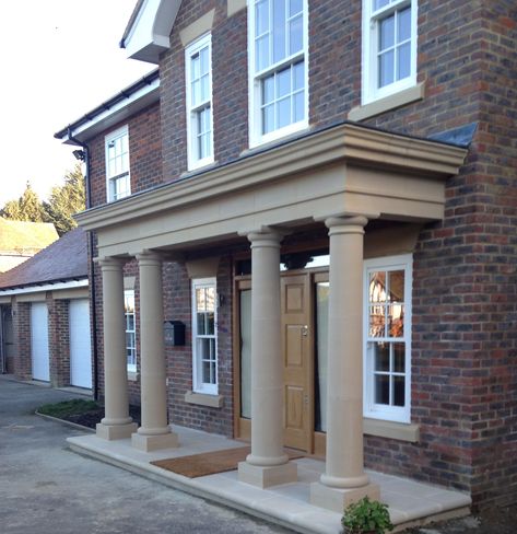 A four column #elegant #portico  - Available from Procter Cast Stone at http://www.caststoneuk.co.uk Portico Column Design, Stone Portico Front Entrances, Round Pillar Design Exterior Entrance, Arch Composite Front Door, Stone Cladding Exterior Pillars, Block Paving Patio, Front Driveway Ideas, Chettinad Stone Pillars, House Layout Design