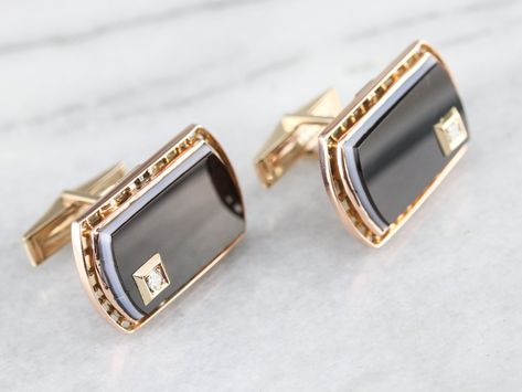 These sleek banded agate and diamond cufflinks have a perfect polish and timeless design, these vintage rose gold cufflinks are in immaculate condition and are ready to wear or give as a gift to the handsome gentleman in your life! Metal: 14K Rose Gold Gem: Banded Agate Gem Measurements: 23 x 14 mm, Cushion Cut Accents: 2 Diamonds totaling .12 Carats, G in Color, I1 in Clarity Measures: 28 x 23 mm Marks: "14K" Stamped on the reverse Diamond Cufflinks Men, Dc Outfits, Handsome Gentleman, Mens Vintage Jewelry, Diamond Cufflinks, Rose Gold Cufflinks, Grooms Gift, Mens Cufflinks, Diamond Cufflink