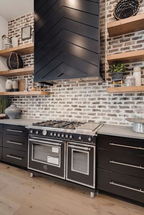 Modern Industrial kitchen design with brick backsplash and matte black appliances. Trending Backsplash, Kitchen Brick Backsplash, Matte Black Appliances, Industrial Kitchen Appliances, Modern Industrial Kitchen Design, Toll Brothers Homes, White Brick Backsplash, Kitchen Brick, Backsplash Options