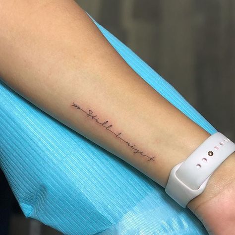 Still I Rise Women Small Forearm Tattoo, Small Forearm Tattoos For Women Writing, Where To Get A Quote Tattoo, Side Wrist Arrow Tattoos For Women, Places On Arm For Tattoos, Scripture Wrist Tattoos For Women, Small Empowering Tattoos, Long Wrist Tattoos For Women, Written Wrist Tattoo