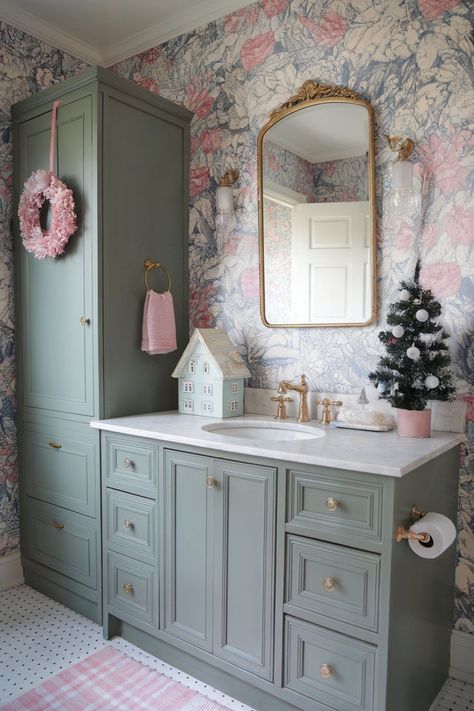 A bathroom styled with vintage Christmas decor, including a pink wreath, a small holiday tree, and a charming pastel color scheme. Wallpapered Bathroom, Bathroom Christmas Decor, Holiday Bathroom Decor, Bathroom Christmas, Bathroom Decor Inspiration, Vintage Pink Christmas, Holiday Bathroom, Christmas Bathroom Decor, Christmas Bathroom