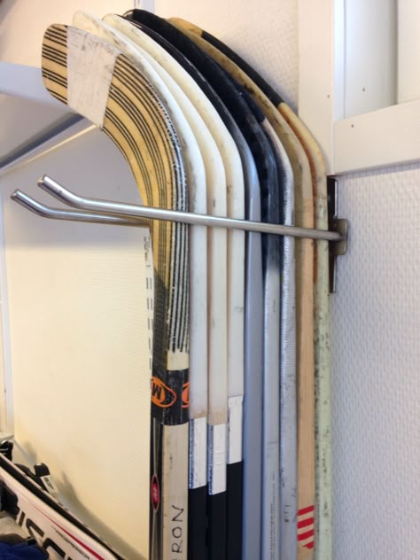 Hockey Stick Storage Ideas, Hockey Stick Organization, Hockey Gear Organization, Hockey Stick Storage Diy, Hockey Stick Holder Diy, Hockey Storage Ideas, Hockey Stick Storage, Hockey Gear Storage, Hockey Drying Rack