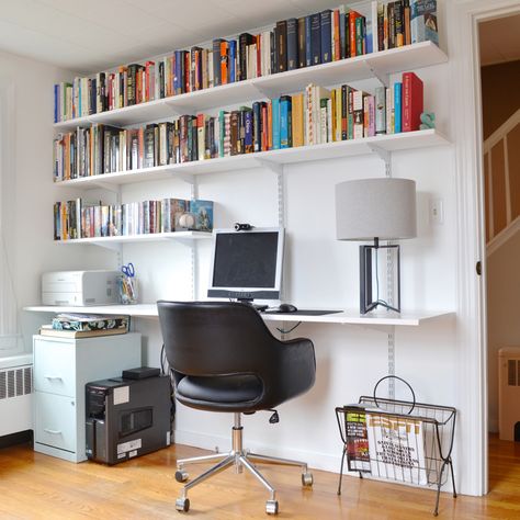 To maximize storage in our home office, I built a hanging shelving and desk unit that holds plenty of books, office supplies, and computer equipment. How To Build A Desk, Track Shelving, Office Design Diy, Hanging Desk, Desk Units, Cheap Office Furniture, Office Organization At Work, Office Shelving, Diy Hanging Shelves