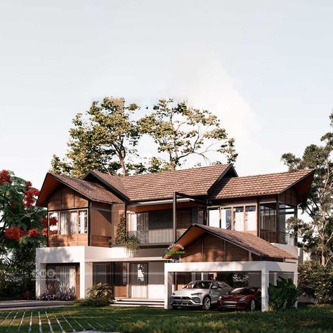 Tropical style house Tropical Luxury House, Kerala Traditional House, Kerala Home Design, Sloping Roof, Kerala Home, Slope House, Modern Tropical House, Tropical Luxury, Tropical House Design