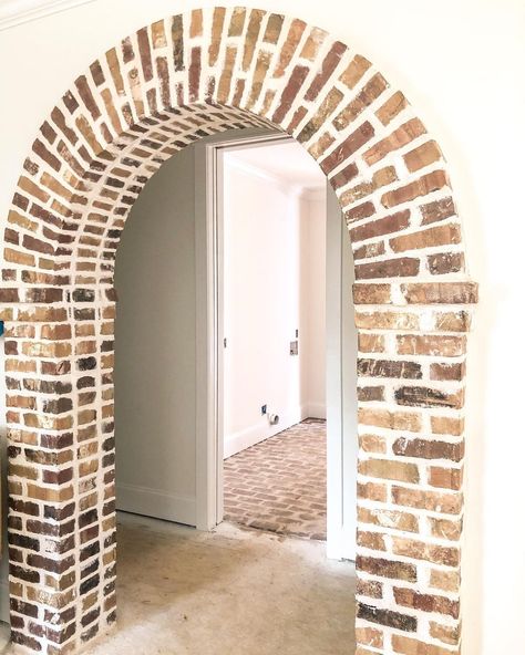 Y’all, the obsession with my moms brick is so real. I’m secretly jealous of her brick arch but thankful she’s only next door so I can see… | Instagram Painted Brick Archway, Stone Around Doorway, Brick Arched Doorway, Arched Door Ways, Bricked Archway, Interior Brick Archway, Arch Hallway, House Binder, Chimney Ideas