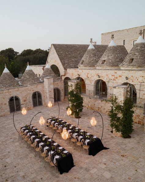 A dreamy destination wedding in Puglia, Italy //⁠ ⁠ ⁠ It’s easy to see why the allure of dining al fresco, gathered around lantern lit tables within a historic Italian courtyard steals the hearts of so many engaged couples. ⁠ ⁠ ⁠ Italy offers a plethora of popular wedding locations; from the Amalfi Coast, and Lake Como, to Tuscany, Venice and Rome. Another firm favourite amongst destination wedding couples is Puglia, boasting a rich history, blue waters, endless olive groves and a magnificent... Couples Italy, Italian Villa Wedding Tuscany Italy, Puglia Wedding Venues, Wedding Puglia, Italian Courtyard, Puglia Wedding Photos, Puglia Wedding, Puglia Italy, Wedding Location