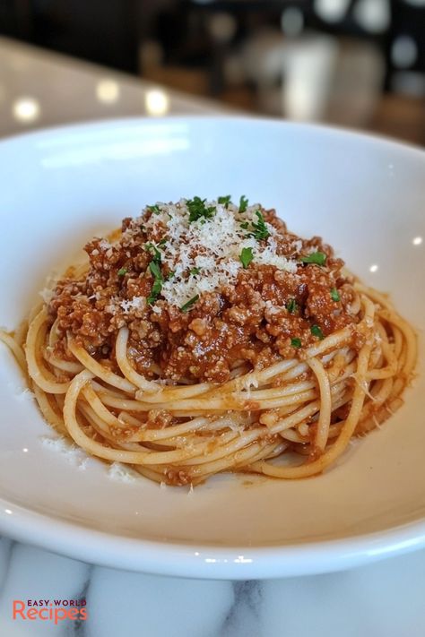 Authentic Italian Spaghetti Bolognese Recipe Traditional Croissant Recipe, French Croissant Recipe, Authentic Italian Spaghetti, Italian Honey Balls, Pain Au Chocolat Recipe, Fried Dough Balls, French Seafood, Bouillabaisse Recipe, Bolognese Sauce Authentic