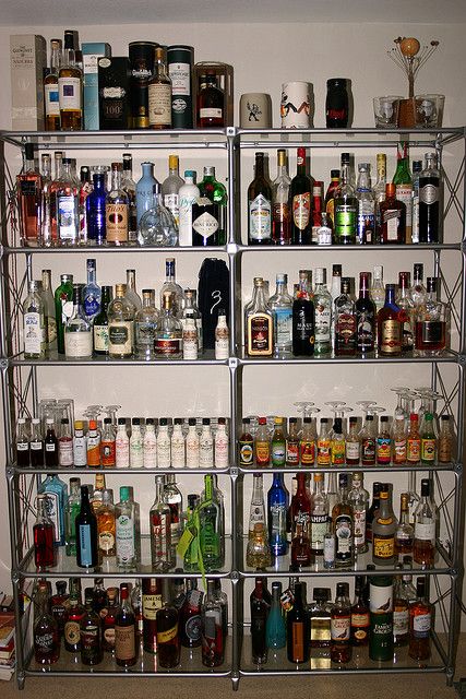 One of my favorite Flicker groups -  people's liquor cabinets Alcohol Shelf, Liquor Cabinet Bar, Spn Dr, Home Bar Plans, Liquor Storage, Liquor Shelf, Bar Plans, Liquor Bar, Cabinet Bar