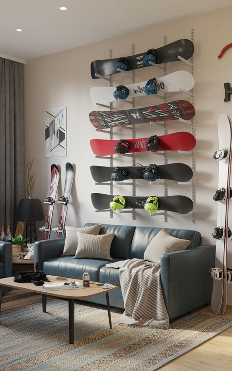 A modern wall rack displaying multiple snowboards in a stylish ski gear room. Snowboard Storage Ideas, Snowboard Room, Ski Gear Storage, Snowboard Wall Rack, Wall Rack Design, Snowboard Storage, Snowboard Wall, Gear Room, Wall Rack