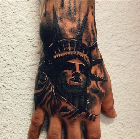 Statue of Liberty Hand Tattoo #inked Statue Hand Tattoo, Boss Tattoo For Men, Patriotic Hand Tattoos, State Of Liberty Tattoo, Small Statue Of Liberty Tattoo, Lady Liberty Tattoo, Statue Of Liberty Tattoo Stencil, Statue Of Liberty Tattoo Sleeve, Logan Tattoo