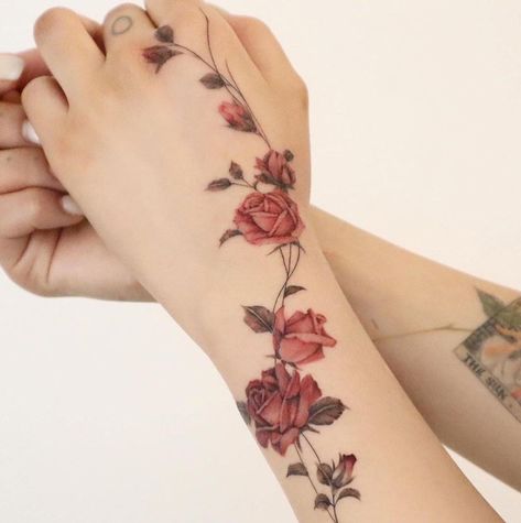 Rose Vine Hand Tattoo, Wrapping Flower Tattoo, Climbing Rose Tattoo, Rose Wrist Tattoo For Women, Rose Wrap Around Tattoo, Floral Hand Tattoos, Grace Tattoo Ideas, Unique Female Tattoos, Food Tattoo Ideas