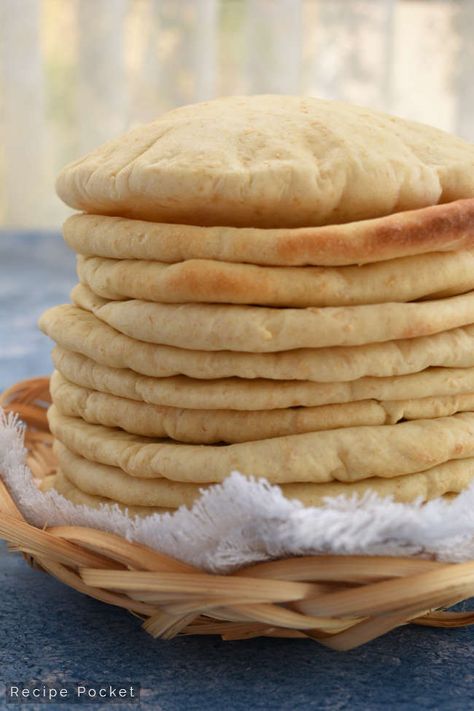 How to make pita bread at home. This pita dough is oven baked and is soft, light and flexible. Easy to make in the bread machine and so much better than store bought. Bake them at high heat and watch them puff and rise as the pocket is created. Only takes 4 – 6 minutes to cooks. Make them with white flour, whole wheat flour or rye. Bake a batch of these and make stuffed pita sandwiches, pita pizzas, pita chips or pita wraps. Recipe make 16 pita pockets and is suitable to freeze. #recipepocket # Make Pita Bread, Pita Wraps, Stuffed Pita, Flatbread Dough, I Lost 100 Pounds, Easy Bread Machine Recipes, Homemade Pita, Homemade Pita Bread, Pita Bread Recipe