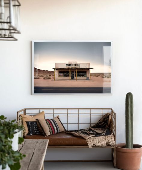 "This minimalistic desert landscape print, entitled \"Lou's Liquor\" is print #5 of 7 in our Roadside Remains Series! This wall decor is the perfect piece for any western, southwestern, or bohemian home. The simple design is great for a home bar or wine room, and the smaller format makes a great addition to a gallery wall. Our Roadside Remains Series posters make a great gift for the road tripper in your family as they're inspired by the long-forgotten places you'll see on a road trip west! *Ple Desert Chic Living Room, Western Bohemian Decor, Western Minimalist Decor, Modern Western Home Decor Living Rooms, Simple Western Home Decor, Desert Aesthetic Decor, Modern Western Decor, Kitchen Apartment Decor, Eclectic Bar