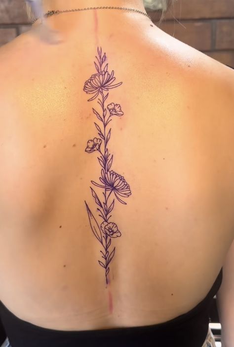 Simple Tattoos Fine Line, Flowers Down Back Tattoo, Behind The Tattoos Ear, March Flower Spine Tattoo, Flower Spine Tattoos With Words, Cactus Spine Tattoo, Female Spine Tattoo Ideas, November Spine Tattoo, November Flower Spine Tattoo