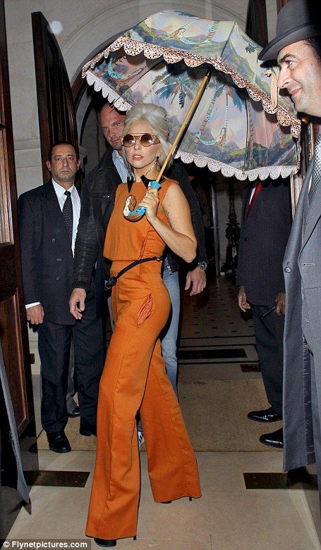 Don't usually consider her "classic beauty," but I actually love this Lady Gaga outfit, even the doorman in the grey suit! Gaga Fashion, Lady Gaga Outfits, Lady Gaga Artpop, Lady Gaga Fashion, Lady Gaga Pictures, Orange Jumpsuit, Jane Russell, Mother Monster, Gene Kelly