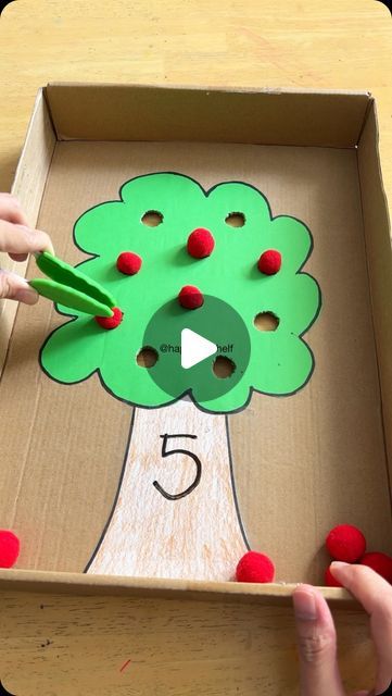 Fynn Sor | Happy Tot Shelf on Instagram: "Nothing beats hands-on learning when it comes to counting! 🍎🔢 Grab a pair of tongs and let your little ones pick up pompom apples to place on the tree. Change the number, and practice counting again—it’s fun every time!

🍎 Perfect for ages 2 to 5:
👉🏻 For 2-3 year olds, focus on counting from 1 to 5.
👉🏻 For 4-5 year olds, practice counting from 6 to 10.

❤️ Is your little one learning to count? Comment ‘COUNTING’ below, and I’ll send you a list of fun, hands-on counting activities to make learning counting a blast!

#HomeLearning #LearningIsFun #HandsOnLearning #PlayAndLearn #EarlyLearning #ToddlerActivities #PreschoolActivities #finemotorskills #mathforkids" Fun Educational Activities For Kids, Fun Educational Activities, Numbers For Kids, Preschool Art Activities, Educational Activities For Kids, Learn To Count, Counting Activities, School Tips, Hands On Learning