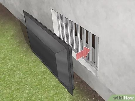 3 Simple Ways to Install Crawl Space Insulation - wikiHow Crawlspace Ideas, Crawl Space Access Door, Crawl Space Vent Covers, Crawl Space Cover, Crawl Space Storage, Diy Crawlspace, Crawl Space Vapor Barrier, Crawl Space Vents, Crawl Space Door