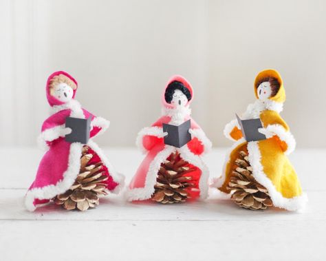 These pine cone and felt carolers are part of my vintage craft series: wonderful projects found in vintage craft books brought to life!  I collect vintage craft books, and flipping through them I always say, "I want to make this!" With the mandatory stay-at-home order I have found all of this great 'extra time,' so I'm giving these projects a go.   I adapted this project from an adorable vintage craft booklet called "Christmas Ideas" by Toni Wood, 1971. I think the original concept was meant for Victorian Carolers, Grandma Activities, Holiday Boards, Christmas Hallway, Elementary Homeschool, Felt Sewing, Diy Christmas Ornaments Easy, Craft Books, Christmas Arts And Crafts