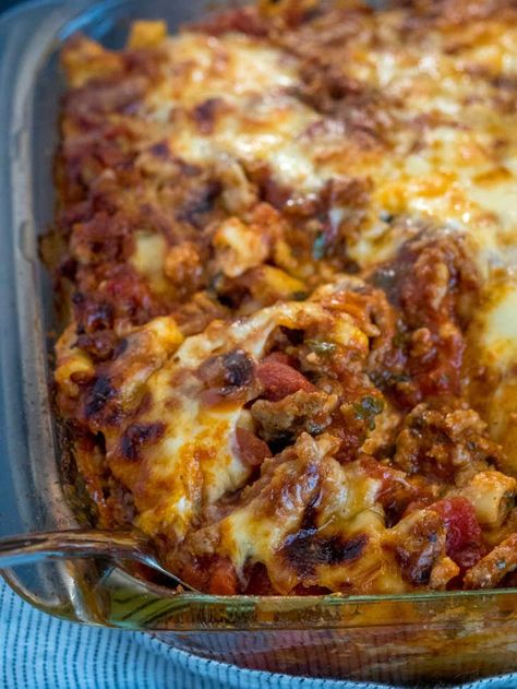 Million Dollar Baked Ziti | 12 Tomatoes Million Dollar Baked Ziti 12 Tomatoes, Ziti Recipes, Baked Ziti Recipe, Pasta Meals, Mild Italian Sausage, Creamy Recipes, Food Charlatan, Dried Basil, Italian Foods