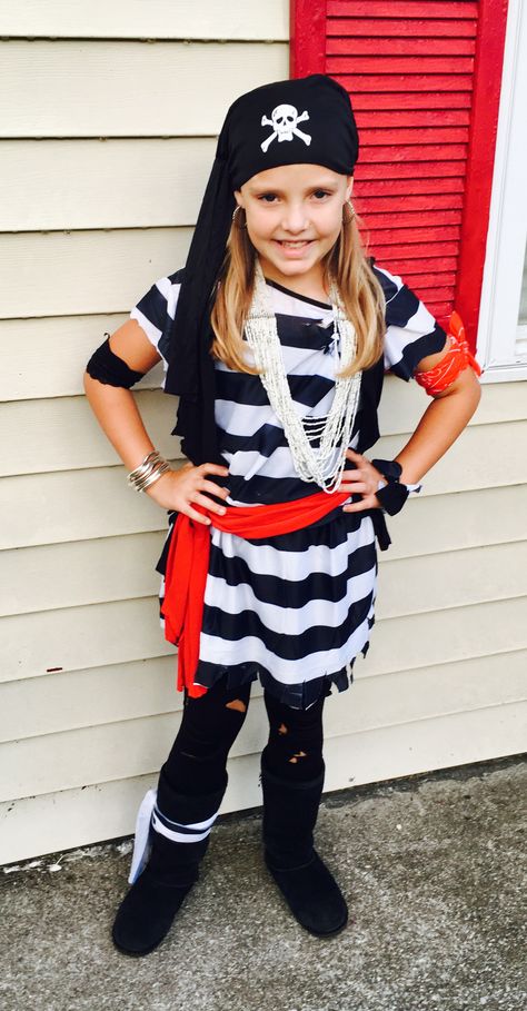 Easy girl's pirate costume made from cheap adult size "prisoner" costume and an old t-shirt. Diy Girls Pirate Costume, Diy Pirate Costume For Women, Diy Pirate Costume, Diy Pirate Costume For Kids, Pirate Man, Homemade Pirate Costumes, Pirate Dress Up, Diy Costumes Kids Boys, Pirate Costume Kids