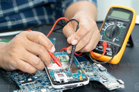 Technician repairing inside of mobile phone by soldering iron. Integrated Circuit. the concept of data, hardware, technology. Learn Car Driving, Electronic Technician, Macbook Repair, Integrated Circuit, Cell Phone Screen, Cell Phone Repair, Laptop Repair, Samsung Device, Event Promotion