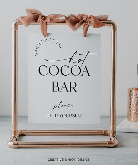 "Let everyone know where the hot chocolate bar is with this great editable sign template! 5x7 and 8x10 sizes included! PLEASE NOTE: This purchase is for a digital template. No physical item will be shipped. * * * * * MATCHING ITEMS * * * * * Build Your Own Bundle and save 60% when you purchase 5 or more items! Go to our shop home page and search: Simply Minimal Or click here: https://tidd.ly/43GgORp * * * * * TRY BEFORE YOU BUY * * * * * https://www.corjl.com/d/6GJOM6 * * * * * HOW IT WORKS * * * * * 1. After you purchase, you will receive an email with a link to log into the (FREE) platform Corjl.com 2. Edit your file on a computer, phone or tablet! 3. Save 4. Download the printable PDF or JPG (with or without bleed and crop marks) 5. Print  * * * * * FILE INFORMATION* * * * * Sizes Inclu How To Make A Hot Cocoa Bar, Cocoa Christmas Bar, Wedding Cocoa Bar, Party Hot Chocolate Bar, Hot Cocoa Bar Wedding, Hot Cocoa Bar Printables, Hot Chocolate Wedding, Hot Chocolate Bar Ideas, Hot Chocolate Bar Party