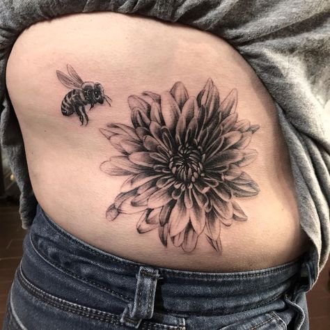 Black Dahlia and honey bee for Jazmin’s first tattoo🐝 By @mikeyctattoo Dahlia Hip Tattoo, Chrysanthemum And Bee Tattoo, Black Dahlia Tattoo Design, Black And White Chrysanthemum Tattoo, Black Daliah Tattoos, Black Dahlia Tattoo, Black Delilah Flower Tattoo, Dahlia Flower Tattoos, Dahlia Tattoo