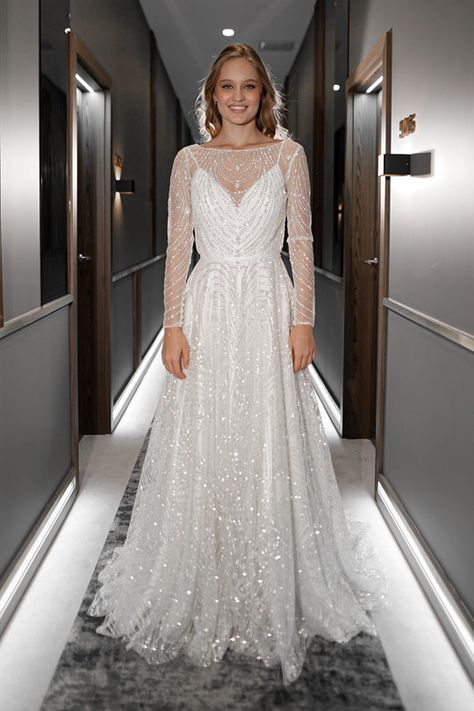 Shop gorgeous a-line wedding dresses in various designs & styles for women of all sizes at Olivia Bottega ❤️ Semi-customize these dresses for a truly unique look ◾ Free shipping ◾ Free custom sizing ◾ Easy alterations ◾ A wedding dress option at affordable prices! ◾ Browse our selection of a-line silhouette wedding gowns online now! | Page 1 Plus Size Wedding Dresses Glitter, 2 In 1 Wedding Dress Convertible, December Wedding Dress, Water Dress, Convertible Wedding Dresses, Olivia Bottega, Sparkly Skirt, Paper Rings, Sparkly Wedding Dress