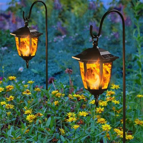 Dynaming 4 Pack Solar Flame Hanging Lights Outdoor, Solar Flickering Flame LED Garden Lanterns with 4 x 38 Inch Shepherd Hooks, Landscape Lighting Waterproof for Lawn Patio Yard Pathway Driveway - Amazon.com Hanging Lights Outdoor, Yard Pathway, Garden Lanterns, Lights Outdoor, Outdoor Hanging Lights, Outdoor Solar, Landscape Lighting, Driveway, Hanging Lights