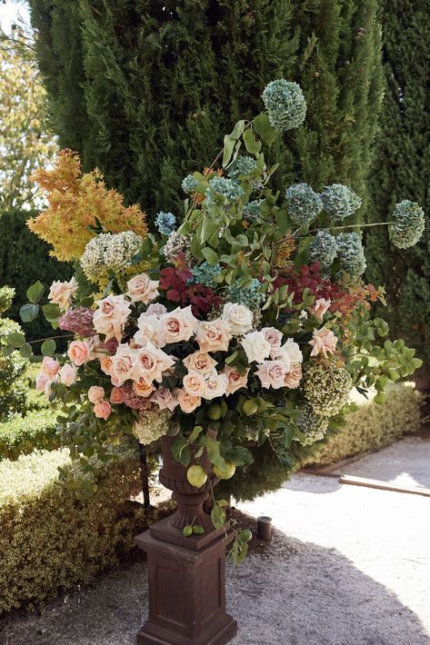 Ceremony Urns Wedding, Dramatic Wedding Florals, Garden Style Centerpieces, Fall Floral Installation, Floral Urns Wedding Ceremony, Old World Floral Arrangements, Christian Walker, Elevated Centerpiece, Vineyard Dinner