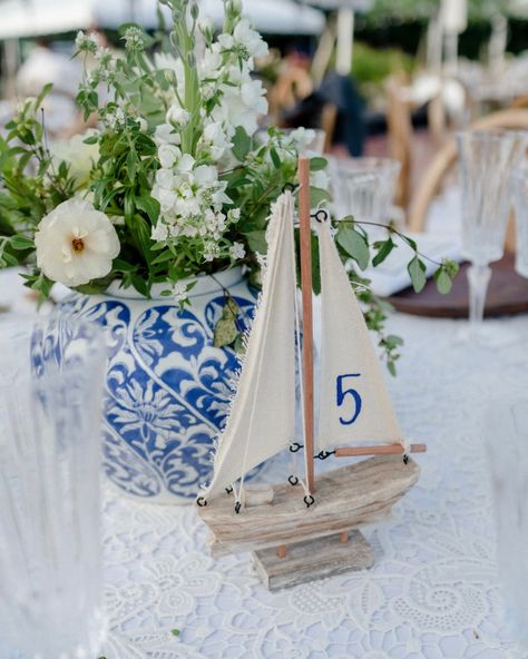 This dreamy seaside wedding was nothing short of stunning! We love when our couple's let us get creative with wedding signage. It's the… | Instagram Buoy Table Numbers Wedding, Sailboat Table Numbers, September Coastal Wedding, Sailboat Wedding Decor, Vintage Coastal Wedding, Italian Coastal Wedding, Oceancliff Wedding, Maine Wedding Decor, Naval Wedding