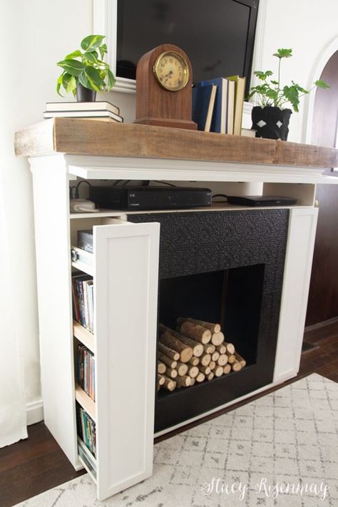 Fireplace with hidden storage! #hiddenstorage #spacesaver #spacesavingfurniture #multifunctional #multifuntionalfurniture #diy Fireplace With Hidden Storage, Hidden Storage Ideas, Faux Fireplace Diy, Cute Little Houses, Faux Fireplace, Diy Fireplace, Home Fireplace, Fireplace Makeover, Space Saving Furniture