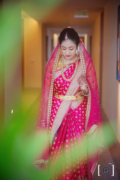 South Indian Brides - Fuchsia Pink Saree with Net Dupatta and Gold Belt | WedMeGood  #wedmegood #indianbride #indianwedding #pink #fuchsia #kanjeevaram #southindianbride #saree Dupatta On Head, South Indian Blouse Designs, South Indian Bridal Jewellery, Marathi Bride, Indian Accessories, South Indian Sarees, South Indian Weddings, Telugu Brides, Bride Portraits