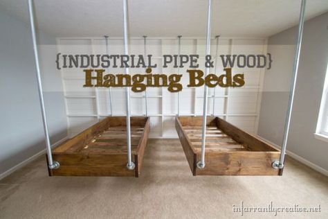 Wall behind bed. Bead board type with 2x4 "frameing over it. Gives look of bare wall but gives lots of small shelving spots. Hanging Bed Diy, Hanging Beds, Hanging Bed, Pipe Furniture, Industrial Wood, Kids Bunk Beds, Industrial Pipe, Style Deco, Boy's Bedroom