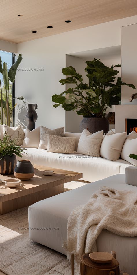 Modern Living Room Plants, White And Wood Interior Design Living Room, White Couch Earthy Living Room, White Couch Living Room Modern, Natural Living Room With Plants, White Bright Living Room, Spa Like Living Room, Plants In Modern Living Room, White House With Plants Interiors