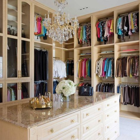 Triple hanging sections in this closet provide plenty of storage while a marble laminate countertop & chandelier add that wow factor. Learn more here: https://www.closetfactory.com/custom-closets/ Closet Factory, Mirror Closet, Contemporary Closet, Closet Vanity, Organized Closet, Amazing Closets, Sliding Mirror, Walking Closet, Closet Rods