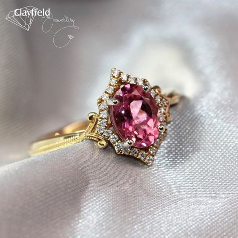 ✨ Vintage allure meets modern elegance! This 18ct yellow gold Art Deco style dress Ring showcases a dazzling 1.25ct Pink Tourmaline, surrounded by 28 Diamonds! The mil grain detail on the band adds the perfect finishing touch💖💎 Shop online & in store NOW! Diamond Dress Ring, Art Deco Pink, Diamond Dress, Gold Art Deco, Dress Rings, Gold Art, The Band, Art Deco Style, Vintage Engagement Rings