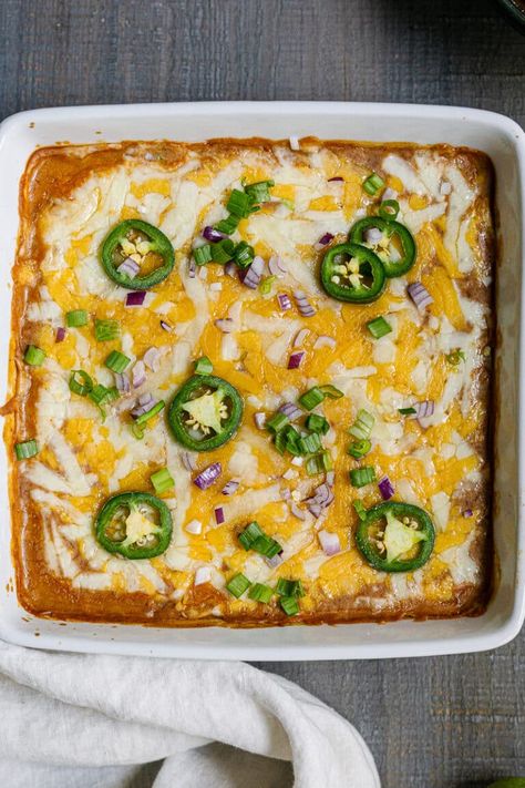 Hot and cheesy refried bean dip full of deliciousness. Made with refried beans, sour cream, salsa, seasonings, jalapeños, and cheese! #beandip #refriedbeans Refried Bean Dip Easy, Leftover Refried Beans, Recipes With Refried Beans, Bean Cheese Dip, Cheese Beans, Refried Bean Dip, Refried Bean, Canned Jalapenos, Refried Beans Recipe