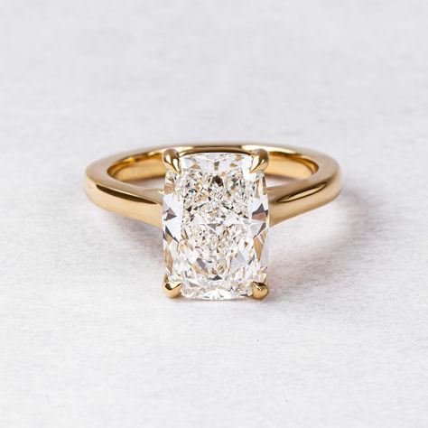 Just a love note to say: She's live Online! 💍 Online one available ❤️ link in bio x P.s Ready to ship rings require 7-10 working days to size to your finger size before shipping it to you. Elongated Cushion Engagement Ring, Yellow Gold Solitaire Engagement Ring, Elongated Cushion Cut, Cathedral Setting, Gold Solitaire Engagement Ring, Elongated Cushion, Yellow Gold Solitaire, Cushion Cut Moissanite, Cushion Cut Diamond