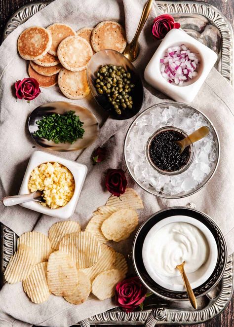 How To Serve Caviar Appetizers - Celebrations at Home Holiday Hosting Aesthetic, Christmas Eve Dinner Aesthetic, Nye Appetizers New Years Eve, Nye Platters, Nye Dinner Party Food, Appetizer Set Up Ideas, Hosting New Years Eve Party Home, New Year’s Eve House Party, New Year’s Eve Dinner Party