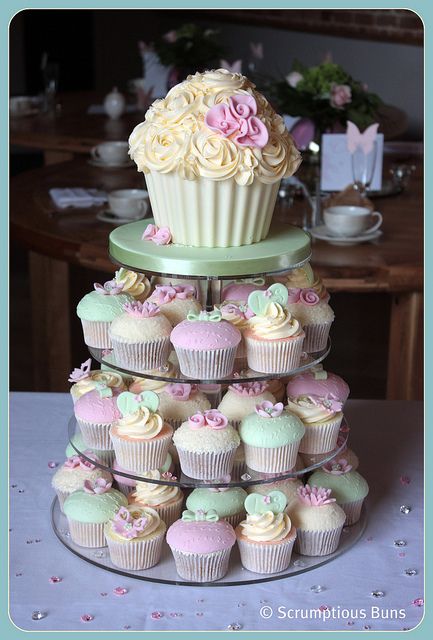 I love this idea, then use the top cupcake as the smash cake. Summer Wedding Cupcakes, Chocolate Giant Cupcake, Cake With Cupcakes, Giant Cupcake Cakes, Cupcake Tower Wedding, Swirl Cupcakes, Cupcakes Birthday, Spring Wedding Cake, Smash Cake Girl