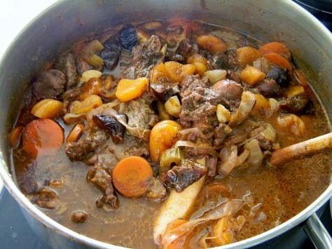 A whole leg of lamb (bone and all) goes into the pot with your standard veggies, lots of garlic, most of the spice cabinet, dried fruit, and a whole bottle of wine! Two and a half hours later it's velvety soft and begging to be spooned over your favourite rice or grain. Mutton Stew Recipes, Mutton Stew, Moroccan Lamb, Mutton Recipes, Lamb Stew, Ras El Hanout, Beef Stew Recipe, Southern France, Global Recipes