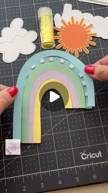 Diana Lola on Instagram: "If you’re a Cricut DS member, this papercraft design is definitely one you won’t want to miss out on! 😍🌈👇🏼  Feeling all the beautiful rays of sunshine & the gorgeous weather outside, it made me want to create a super cute rainbow themed cake topper. If you already follow me, you know that I’m ALL about those details & this design of mine my crafty friends, has every ounce of it! There’s Distressed Oxide Ink applied, as well as embossing to the cardstock and who couldn’t forget those multiple layers that I so love to add to my paper decor & @bearlyarts Cubies were right there to help me in creating those lovely layers. 👏🏼🤗 The adorable font for this design was a @creativefabrica font “Emilya Birthday” & can be found on their website, if you decide to use it. Birthday Rainbow Theme Decoration, Rainbow Themed Cake, Sunshine Birthday Theme, Diy Cake Topper Birthday, Rainbow Cake Topper, Hot Temperature, Sunshine Cake, Baby First Birthday Cake, Rays Of Sunshine