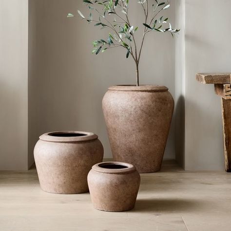 KEY DETAILS Ficonstone in a Sand finish. Has drainage holes. Suitable for outdoor use. Frost-proof. Sold individually. Made in Vietnam. Black Olive Tree, Modern Planters Outdoor, Planter Liners, Outdoor Urns, Olive Plant, Colin King, West Elm Kids, Patio Planters, Urn Planters